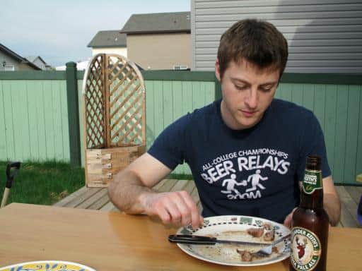 close up of a man enjoying his meal in the deck