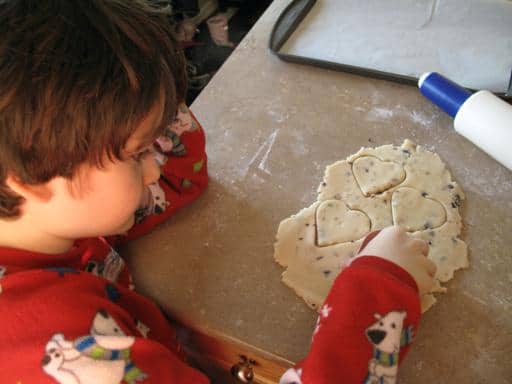 cutting the dough into heart shapes
