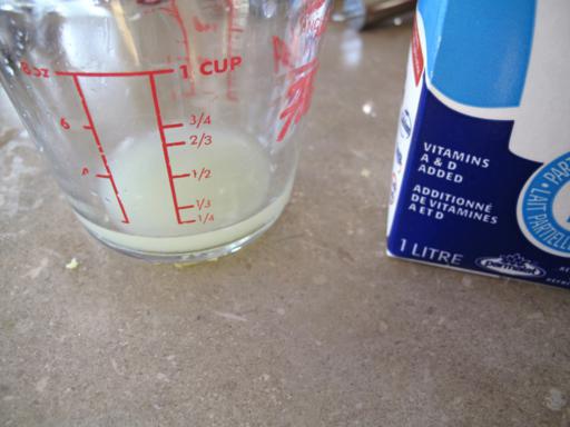 lemon extract in a Pyrex measuring cup