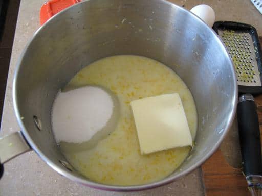 butter and sugar added to the mixture of lemon juice