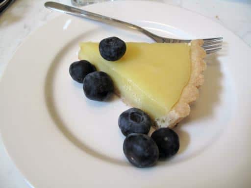 lemon slice tart in a white plate