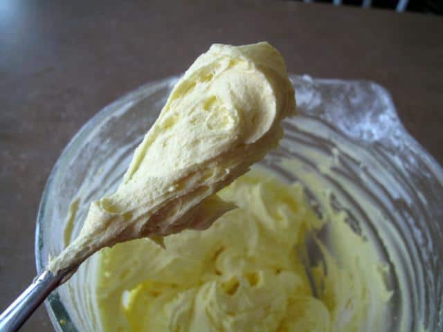 whipped Lemon Buttercream Icing in the mixing container