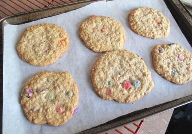 Baked Smartie Oatmeal Cookies in Cookie Sheets with Parchment Paper