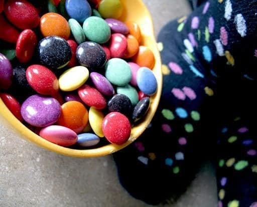 Colorful Smarties in Orange Bowl for Smartie Oatmeal Cookies