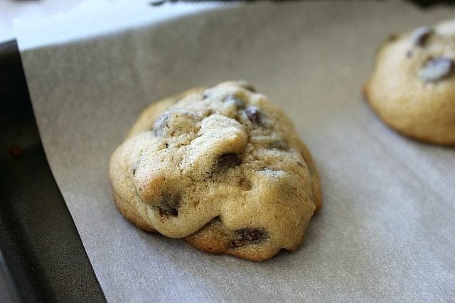 freshly baked chocolate chip cookie in parchment paper