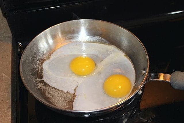 Two Ducks Eggs in a Frying Pan with Butter