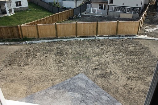 housefirstwalkthrough5 downward shot of the house backyard