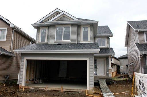 view of new house with vacant lot