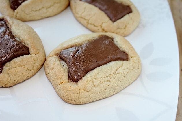 4 pieces of Butterfinger Brick cookie in a white plate