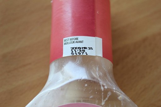 close up of salad dressing in a bottle's expiration date