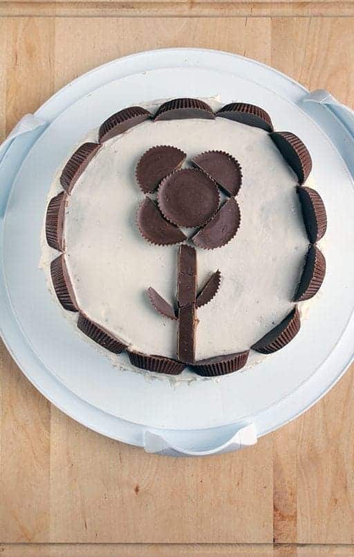 Top down shot of Reese’s Peanut Butter Cup Cake with flower design