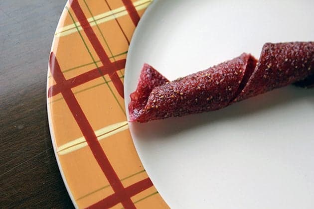 Twisted Rhubarb Strawberry Fruit Leather in a plate