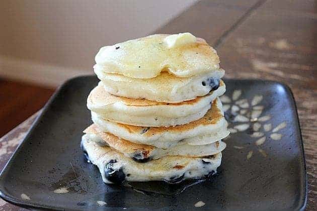 Stack of Blueberry Greek Yogurt Pancakes in Black Plate