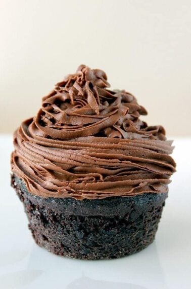 chocolate muffin topped with Chocolate Buttercream Frosting