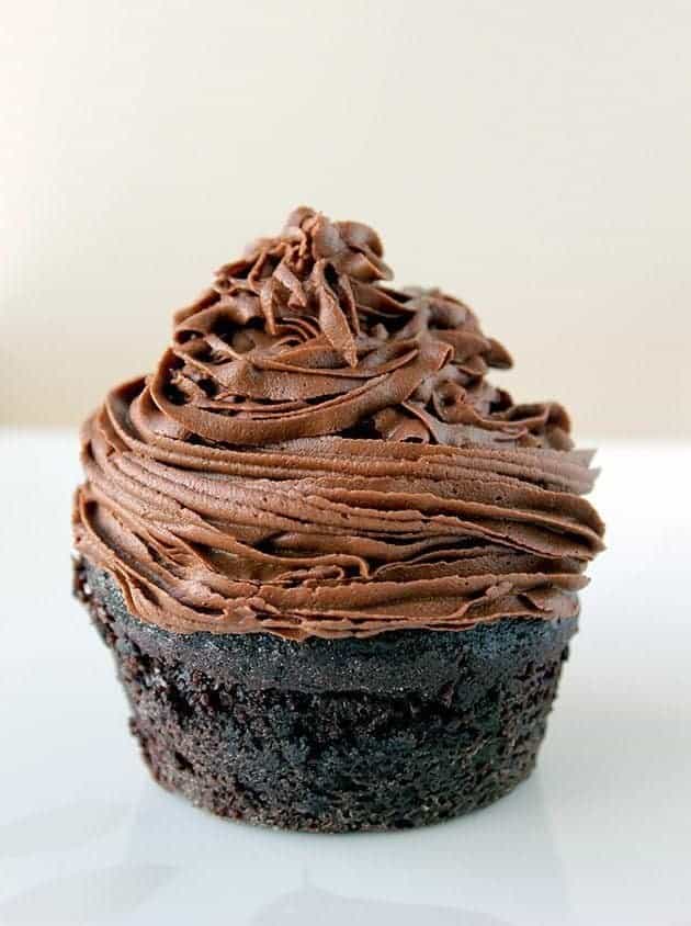 chocolate muffin topped with Chocolate Buttercream Frosting 