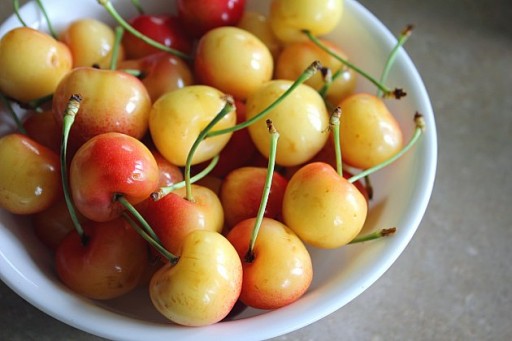 a bowl of fresh cherries