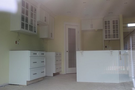 another shot of finished kitchen with cabinets on a different lightning