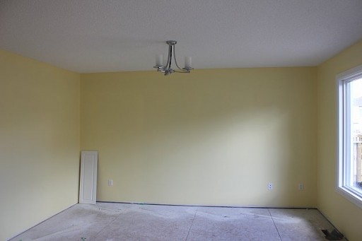 large vacant space and walls are painted with light yellow