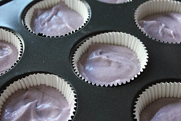 cupcake tins with white cupcake liners ¾ full of mixture