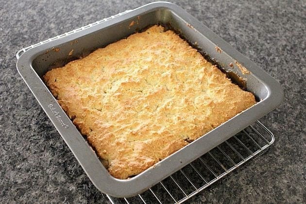 Top of baked pear cobbler in a baking pan