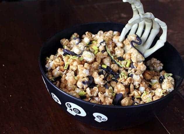 Buggy Caramel Popcorn in spooky black bowl