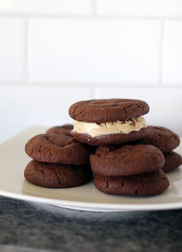 white plate with soft, chewy cocoa cookies and a Chocolate Ice Cream Sandwich Cookie