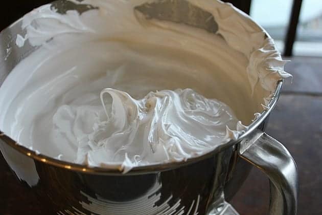 whisked egg whites and sugar in a very stiff peaks form for meringue