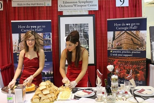 group of two ladies from Edmonton Symphony, wearing red dresses