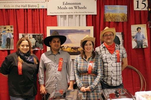 group of four from Meals on Wheels, wearing cowboy hats