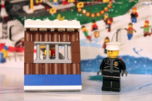 police post lego with the police and prison inside it