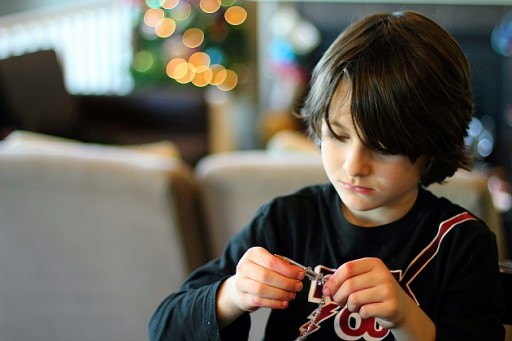 young boy looking down