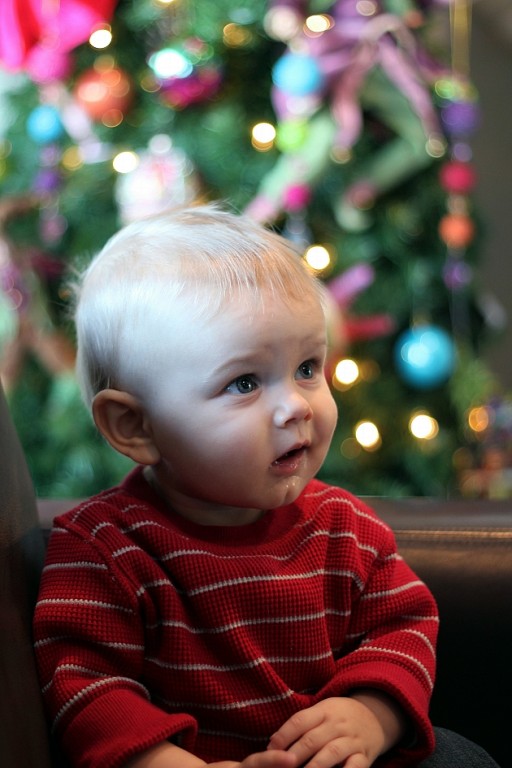 cute baby wearing red knitted shirt