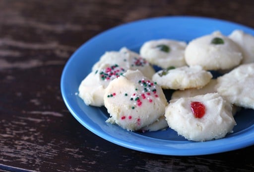 close up of whipped shortbread in blue plate