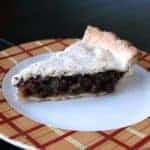 slice of Raisin Pie in a plate with checkered prints