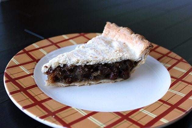 checkered plate with a slice of Old Fashioned Raisin pie