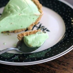 Slice of Frozen Creamy Lime Pie in a plate