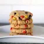 Close up of Stack of Reese's Pieces Peanut Butter Cookies in a white plate