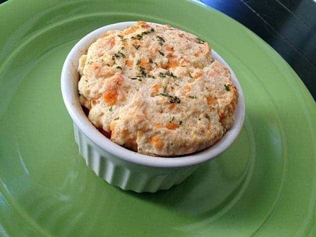 Mini Chicken Pot Pies in White Ramekins Topped with Best Biscuits Ever