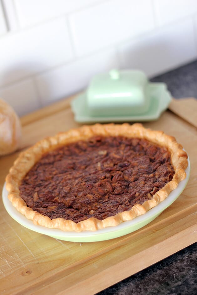 Sugar Pie in a white pie pan on wood table