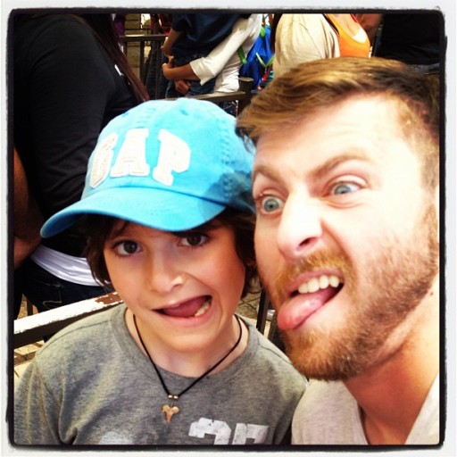 little boy and a man in wacky faces