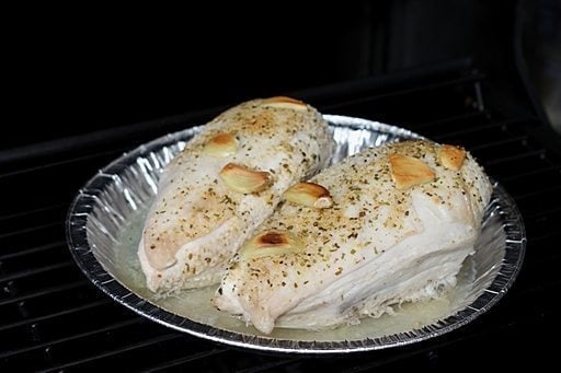 two pieces baked chicken breast