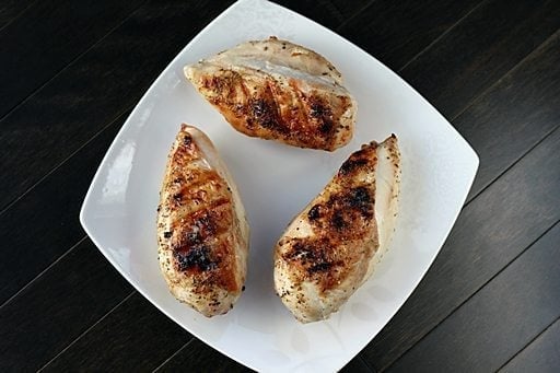 Three Pieces BBQ Chicken Breast in White Plate Ready to Enjoy