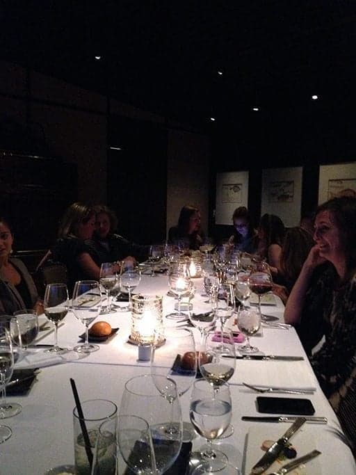 ladies sat around the long table chatting