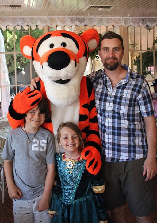 kids photo with Tiger character and Dad
