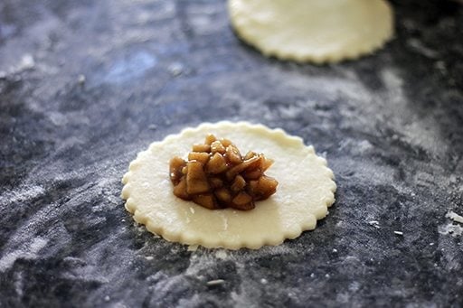 a tablespoon of filling placed in dough circle