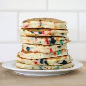 Stack of Homemade Funfetti Pancakes in a White Plate