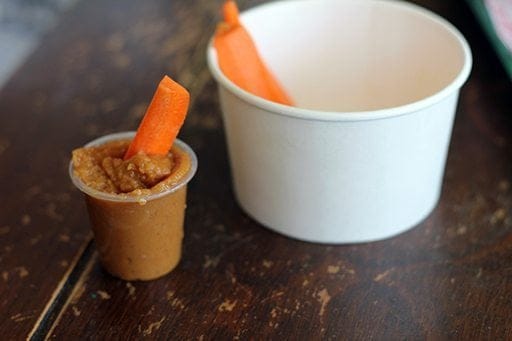 Thai Peanut Dip and carrot sticks in a cup