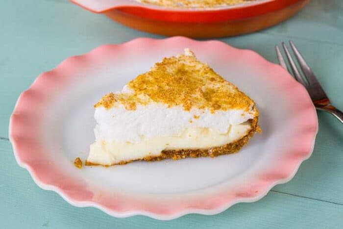 Flapper Pie in a plate and in the baking pan on turquoise background