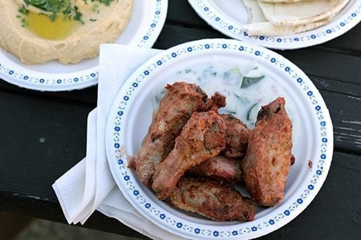 some pieces of tandoori chicken wings in a plate