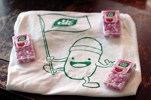 t-shirt with newest Tic Tac character on it and and three very large packages of the tasty new Strawberry Fusion Tic Tacs